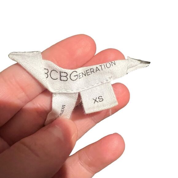 3 for $30! BCBGENERATION black sleeveless romper - Picture 3 of 10